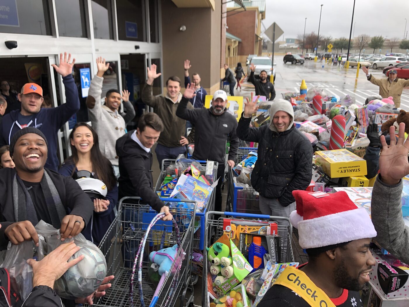 The Myers Home Buyers team at a community toy drive in DFW