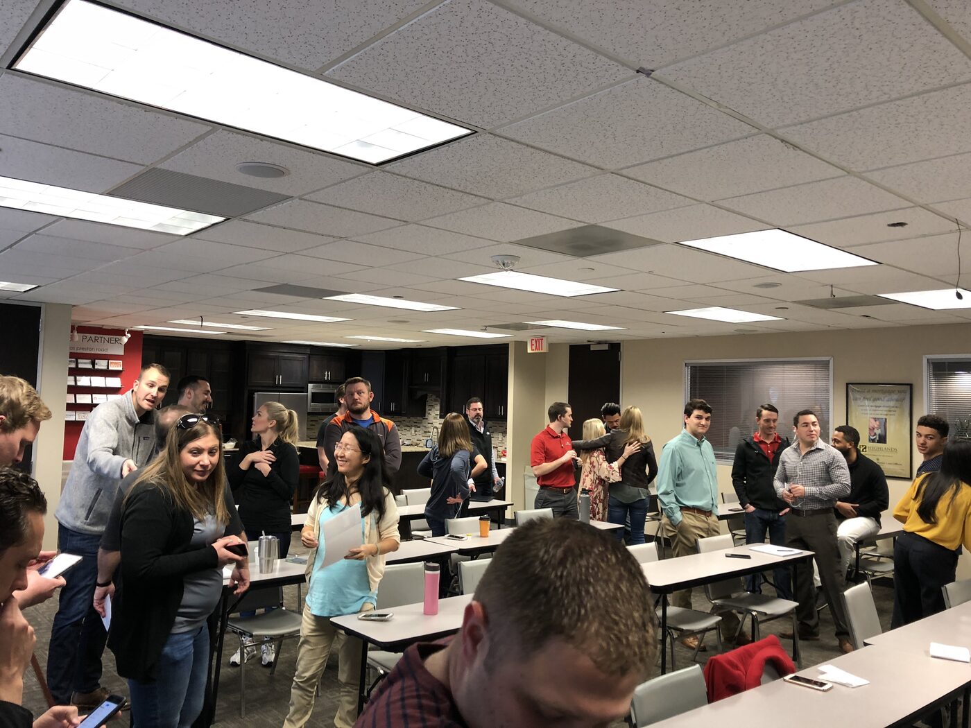 The Myers Home Buyers team gathered at a company meeting